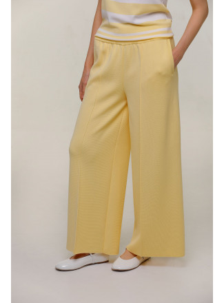 Довгі широкі штани зі стрілкою жовті