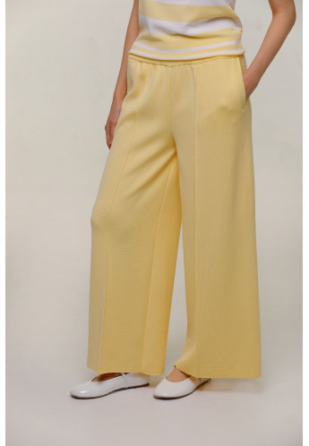 Довгі широкі штани зі стрілкою жовті