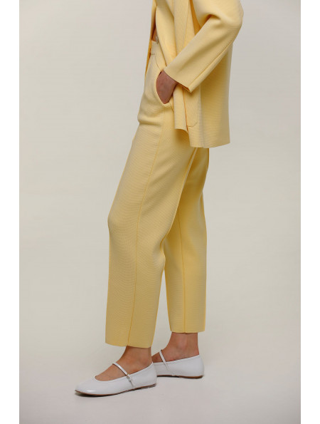 Трикотажні штани з кишенями світло-жовті