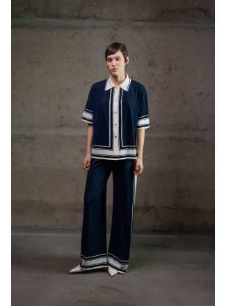 Трикотажні штани з контрастним обрамленням темно-сині