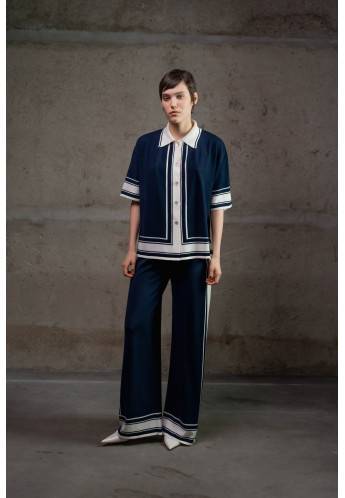 Трикотажні штани з контрастним обрамленням темно-сині