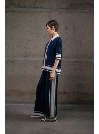 Трикотажні штани з контрастним обрамленням темно-сині