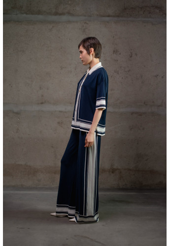 Трикотажні штани з контрастним обрамленням темно-сині