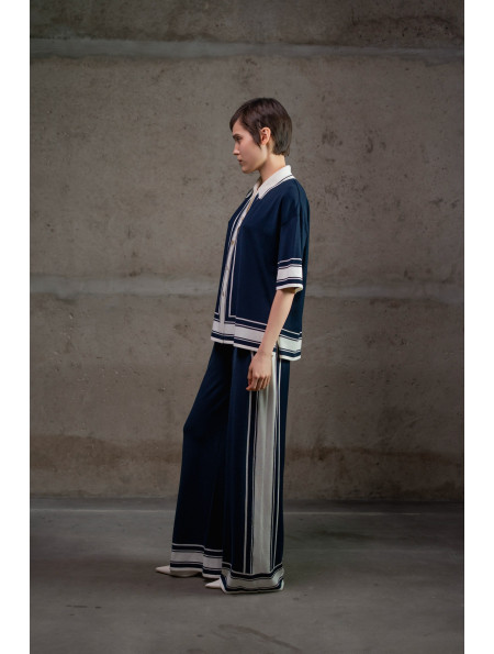 Трикотажні штани з контрастним обрамленням темно-сині