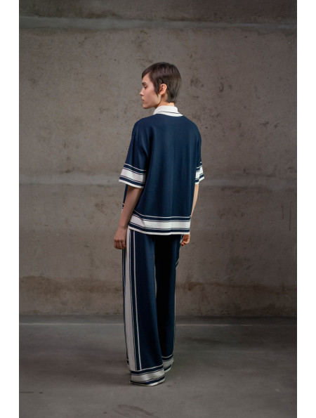 Трикотажні штани з контрастним обрамленням темно-сині