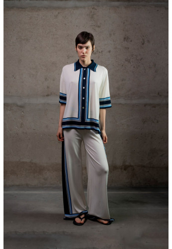 Трикотажні штани з контрастним обрамленням молочні