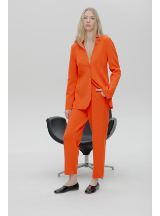 Трикотажные брюки с карманами оранжевые